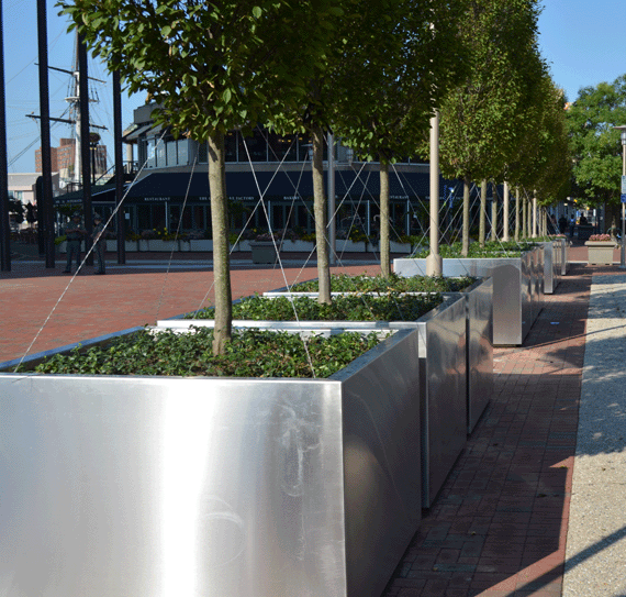 Public Street Barrier created by stainless steel planters in Baltimore Maryland